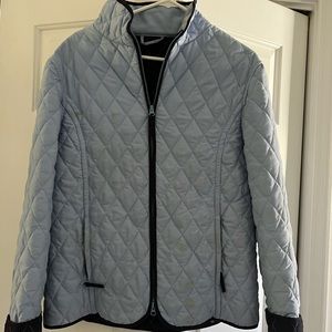 Blue zippered fall coat. Length to hip
